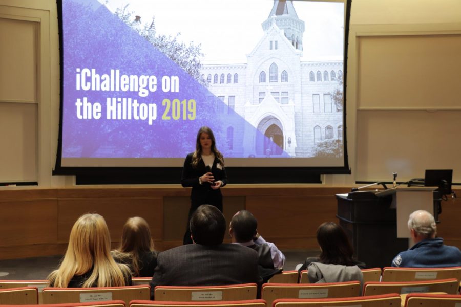 Rachel Davis presents her idea to attendees at the iChallenge event in Carter Auditorium. Davis won first place in the competition with her idea for face recognition on handguns.