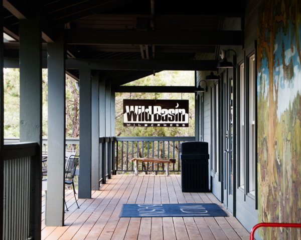 Sign of the Wild Basin Wilderness Preserve at the entrance of the Wild Basin Creative Research Center.