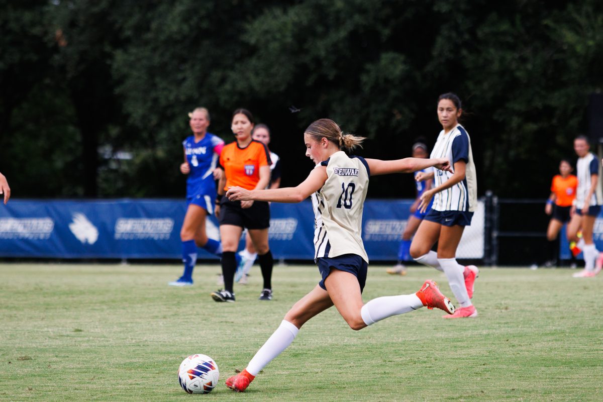 Sophomore forward Rainey Simmons prepares to set the ball back into the game and into Hilltoppers possession. Simmons played for 81 of 90 total minutes in the game.