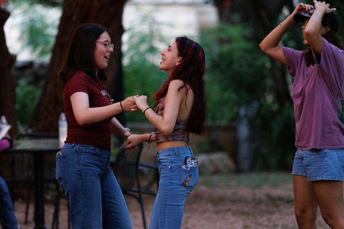 Students embrace the spirit of Hispanic Heritage Month as they learn and perform basic zapateo steps, guided by Ballet Folklórico dancers on Ragsdale Lawn at St. Edward's University.
