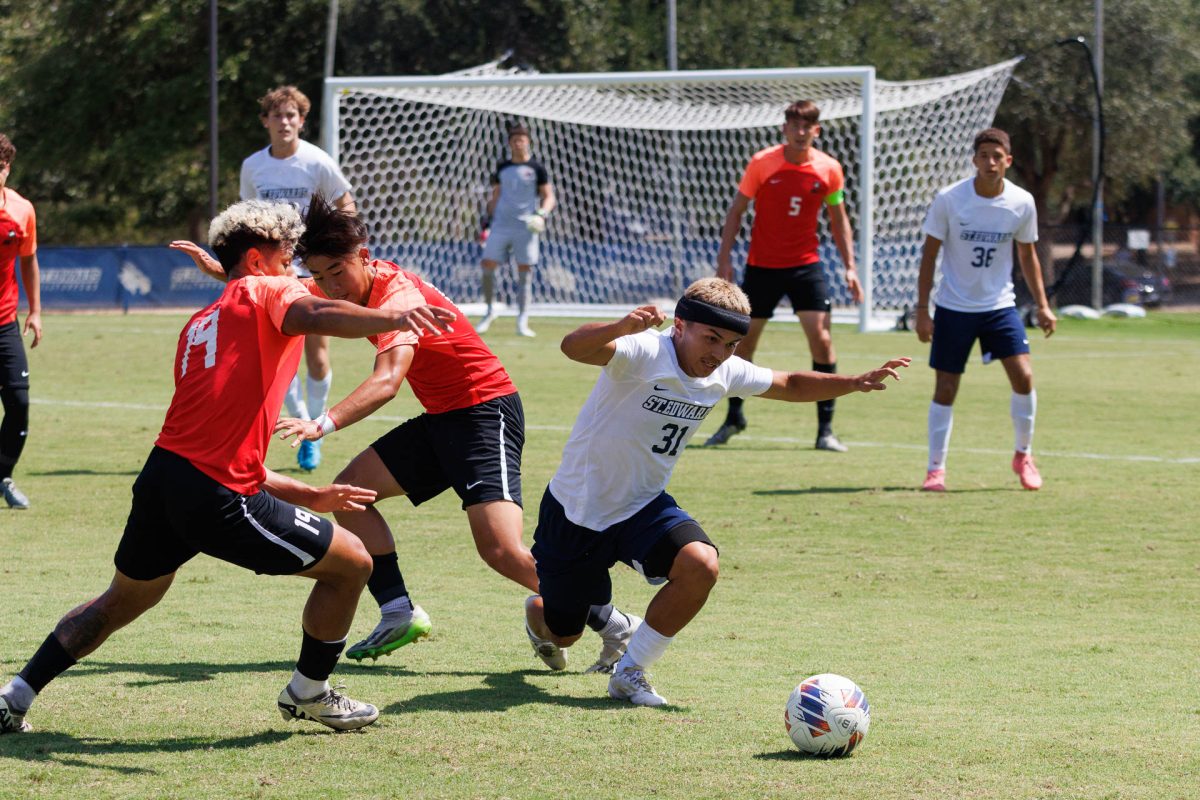 Freshman forward Izaiah Garza crosses Urban Knights’ defense to maintain possession. During the 71 minutes that Garza was on the field, he had three shot attempts, one of them on goal. 