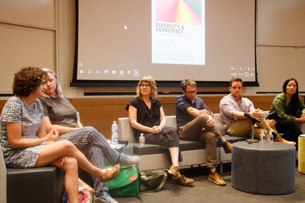 Professors bring their academic expertise to discussion at a Q&A panel about diversity and democracy, led by Emma Woelk. The professors each provided a different perspective on the topic, varying from areas of study such as political science, women and gender studies and social work.