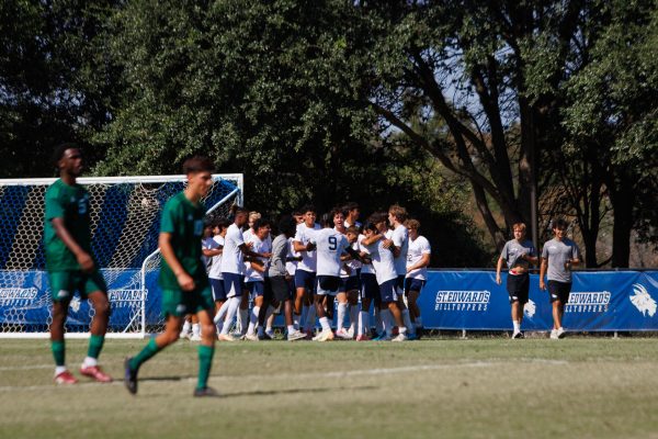 The Hilltoppers celebrate a goal scored by sophomore forward Vicente Alvarez. The Greyhounds were able to score again, less than 20 seconds afterwards, giving the players more grit and determination to score a second goal.