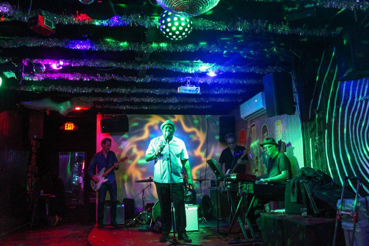 Keith Dunn (center) and band kick off the festival with the first performance on the last day. Outer Heaven’s ambient lighting compelled viewers to remain fixated on his breathtaking performance of groovy blues.