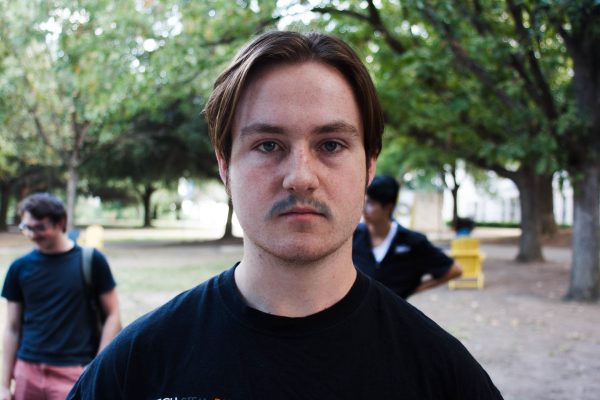 Sophomore Zane Cummings rocks his blue-dyed mustache. Cummings, no stranger to facial hair, made the decision to wear his mustache after a series of Instagram polls – where his followers voted for their preferred facial hair. 