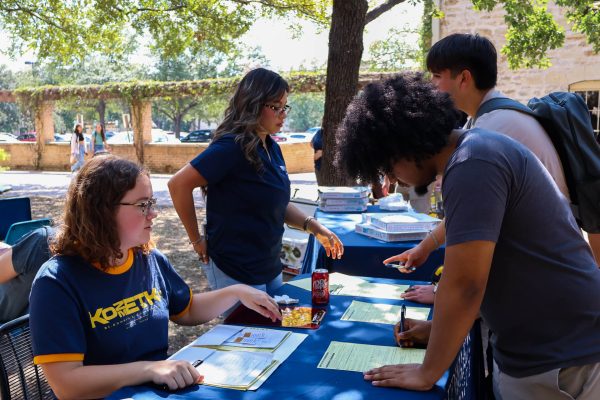 Kozmetsky Intern Grace Hosek and Jackeline “Jackey” Guajardo working together to register event attendees to vote. The event’s positioning sought to attract those passing by as well as those who had previous knowledge of the panel.