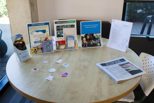 The Health and Counseling Center’s outreach initiatives include informational displays with resources ranging from 'What is Counseling?' guides to faculty mental health support materials.