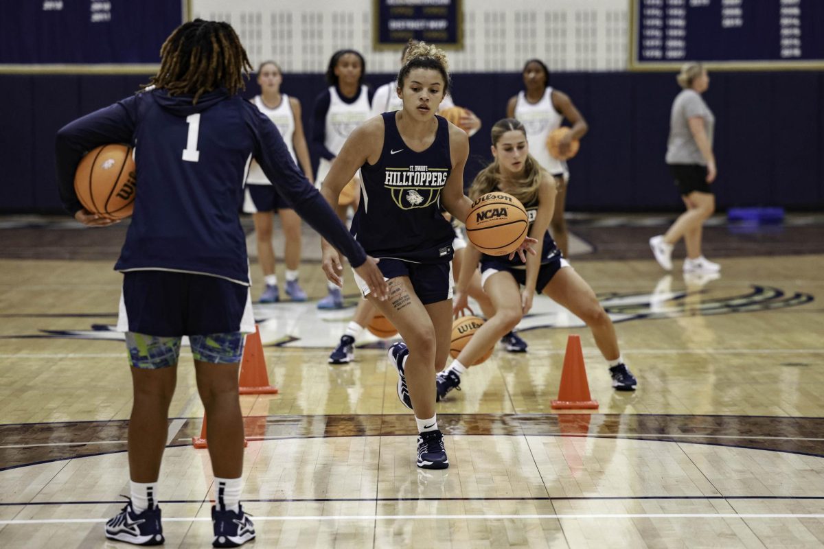 Women’s basketball head coach J.J. Riehl reflected on this season coinciding with the 50th anniversary of women’s sports on the hilltop. “I think women's basketball and women's sports in general, but specifically women's basketball, there's a huge growth in the popularity in how many people are watching it and how many people are endorsing it and how many people are supporting it,” Riehl said. “I think it's just a huge, unbelievable time to be a part of women's basketball. I think all of that just comes back to an overwhelming sense of gratitude that I get to do this at a place that I truly love. And yeah, it's going to be a cool year. Lots of cool celebrations, lots of cool alums coming back throughout the year. I'm just excited, honestly, I'm excited to showcase our team… so proud of them, not just as basketball players, but as leaders and human beings. And so I couldn't be more proud to be the 50th year with this group. I think St. Ed's basketball is in great hands with them.” 