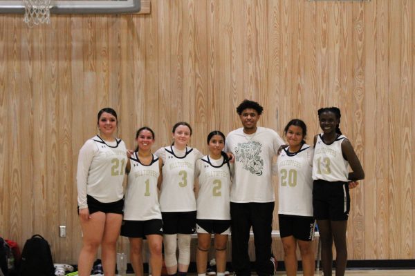 The women’s club basketball team poses after their first win of the season. “These girls come into practice and they work hard every single time,” Rae said. “They take their time out of their day outside of practice to work on their skills too, so they're not only coming to practice and working hard, but they're doing it on their own time too. They have a lot of dedication, they have commitment, and that's all I could ask for. They work really hard in practice. They help each other out. We're in practice, and if someone is struggling, whether it's a bad day or they just can't get a skill down, some of the other teammates are there to help 'em, pick 'em up, show 'em how to do it. We work as one unit and these girls have put in so much hard work, and even with just six of us, we have grown so much. And tonight we pulled off this win. And I think that it also wouldn't be fun without them. They have such great energy, especially in practice, keeping it lighthearted. We're always supporting each other, we're always making each other laugh, and it's just all making it worth it. And that's why I do this. That's why I want to manage the team, so that I can make the program possible for them to play.”