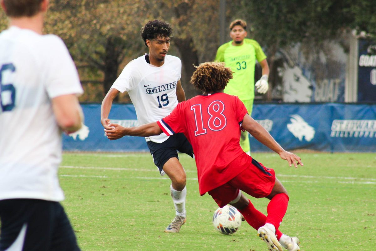 Irvin Abarca, who scored SEU’s first goal against Dallas Baptist University, dribbles against a Patriots’ forward. Throughout this season, Abarca has played all 17 games of the season, and accounted for four assists and scored his first goal during the Homecoming game. 