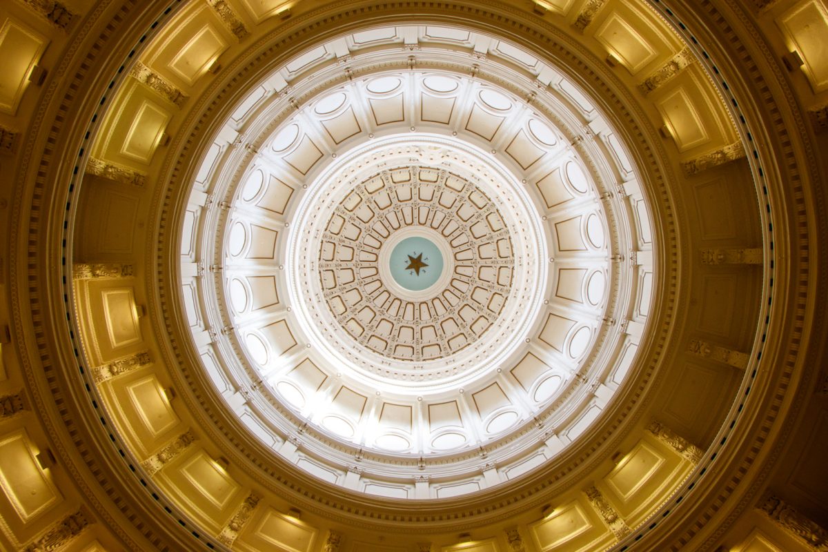 A star with the letters of the word "Texas" sits in the center of the Rotunda at the Texas State Capitol building in Downtown Austin. The state's name is derived from the Caddo word "táy:shaʼ," meaning friend. Early Spanish settlers interpreted this as "Tejas" and used it to refer to the Caddo people. 