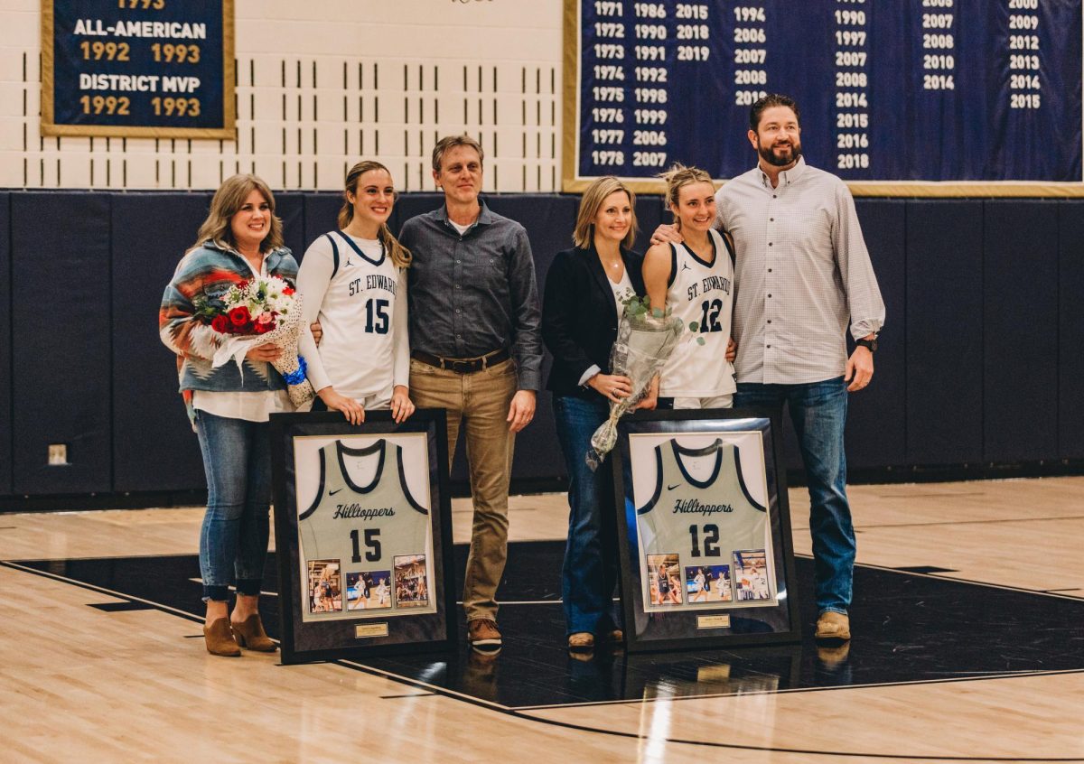 Isabel Langenberg and Ainsley Thunell pose with their parents and Senior Day memorabilia celebrating their career on the hilltop. Last season, Langenberg had a total of 45 rebounds, 10 steals, eight assists and 123 points. Her highest scoring game was last season's matchup against OCU, the same opponent the one from her Senior Day, with a total of 15 points. This season, Thunell has averaged 6.3 points, 1.7 assists, 5.2 rebounds and 1.3 steals. She had a season high performance on Dec. 19, scoring 18 points against Arlington Baptist University.