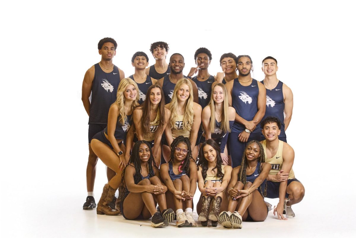 Sprinters, hurdlers, and jumpers get together for a team picture during the Track & Field media day. Most of the athletes pictured here had their second race of the season on Jan. 25, and their third race will be this upcoming weekend.