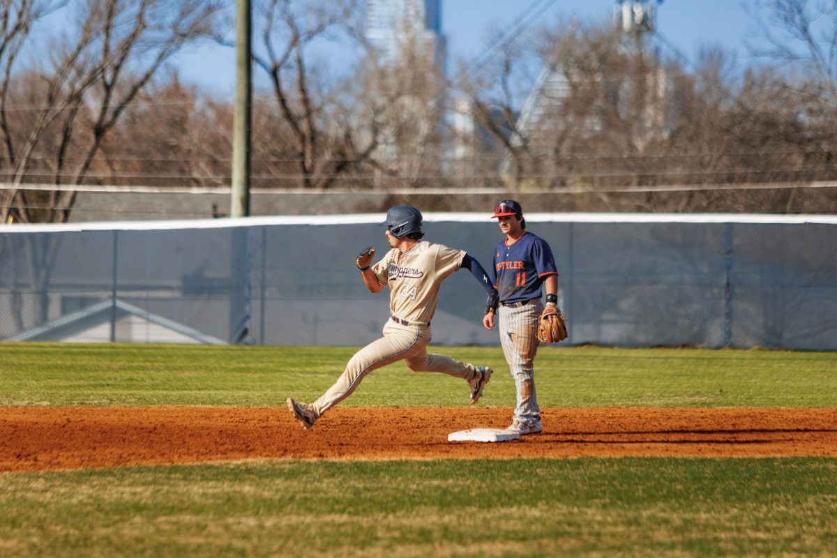 Catcher Diego Solis runs by second base, later scoring one of the two runs for the Hilltoppers. In the bottom of the fifth inning, Trevor Sebek hit the ball to right-center field, allowing both Solis and Nicholas Anderson to put St. Edward’s in the scoreboard.